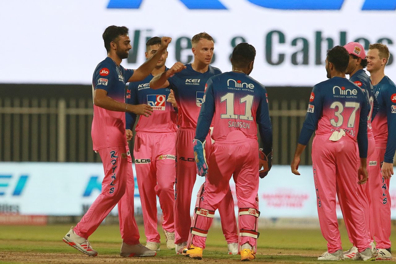 The Rajasthan Royals players gather together to celebrate a wicket, Rajasthan Royals v Chennai Super Kings, IPL 2020, Sharjah, September 22, 2020