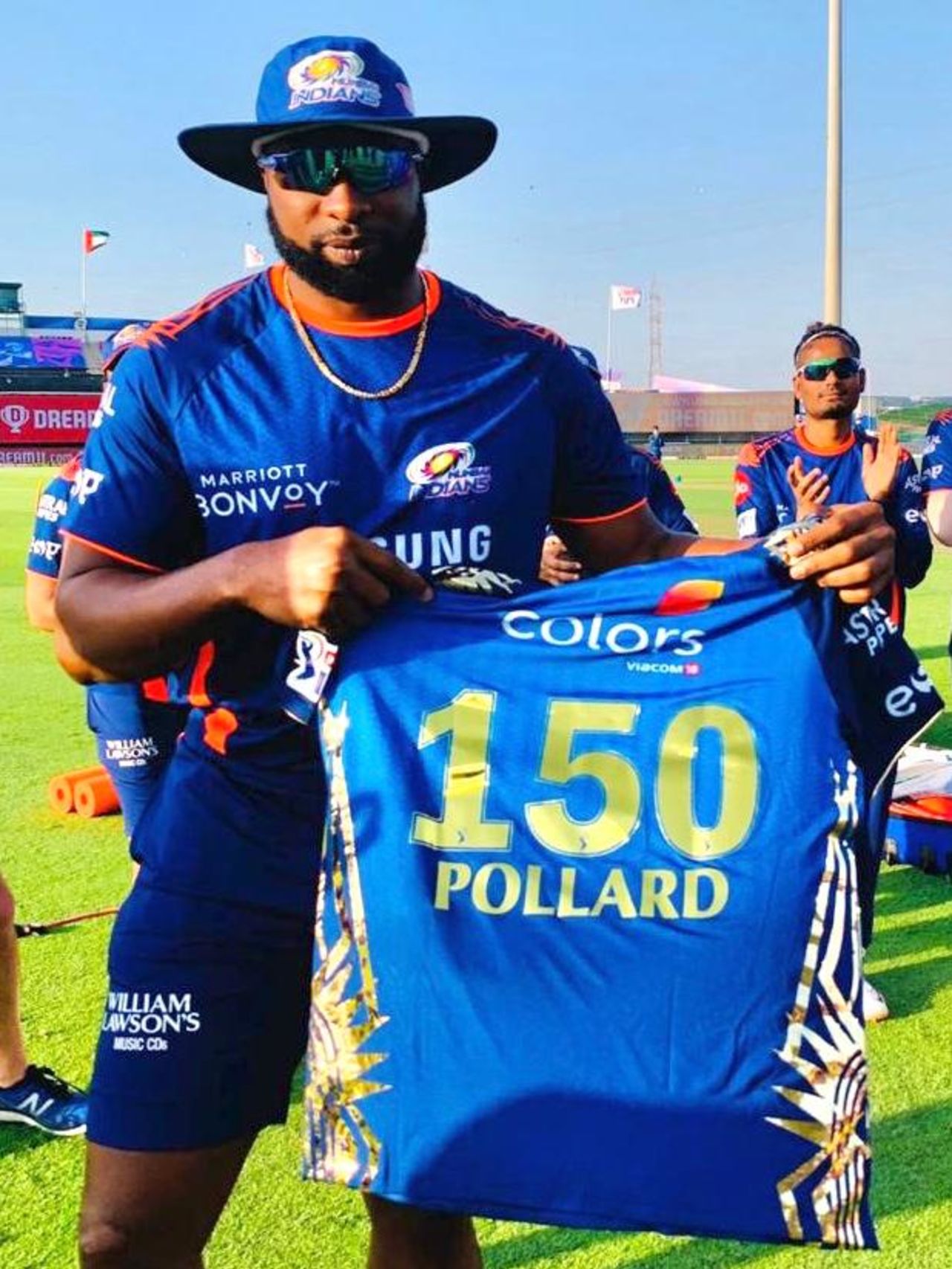 Keiron Pollard celebrates playing his 150th match for Mumbai Indians, Abu Dhabi, September 23, 2020