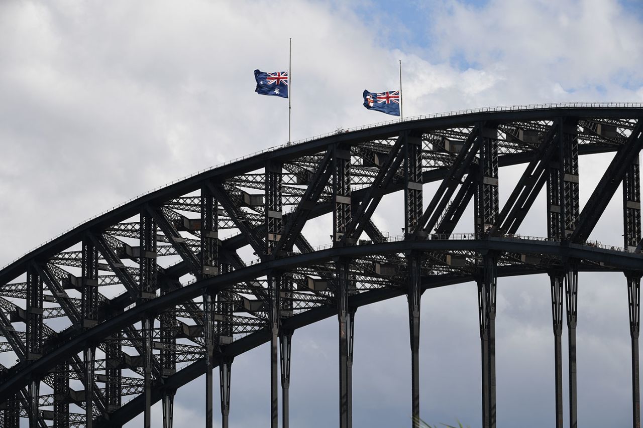 Flags fly at half mast on Sydney Harbour Bridge in memory of Dean Jones, Sydney, September 25, 2020