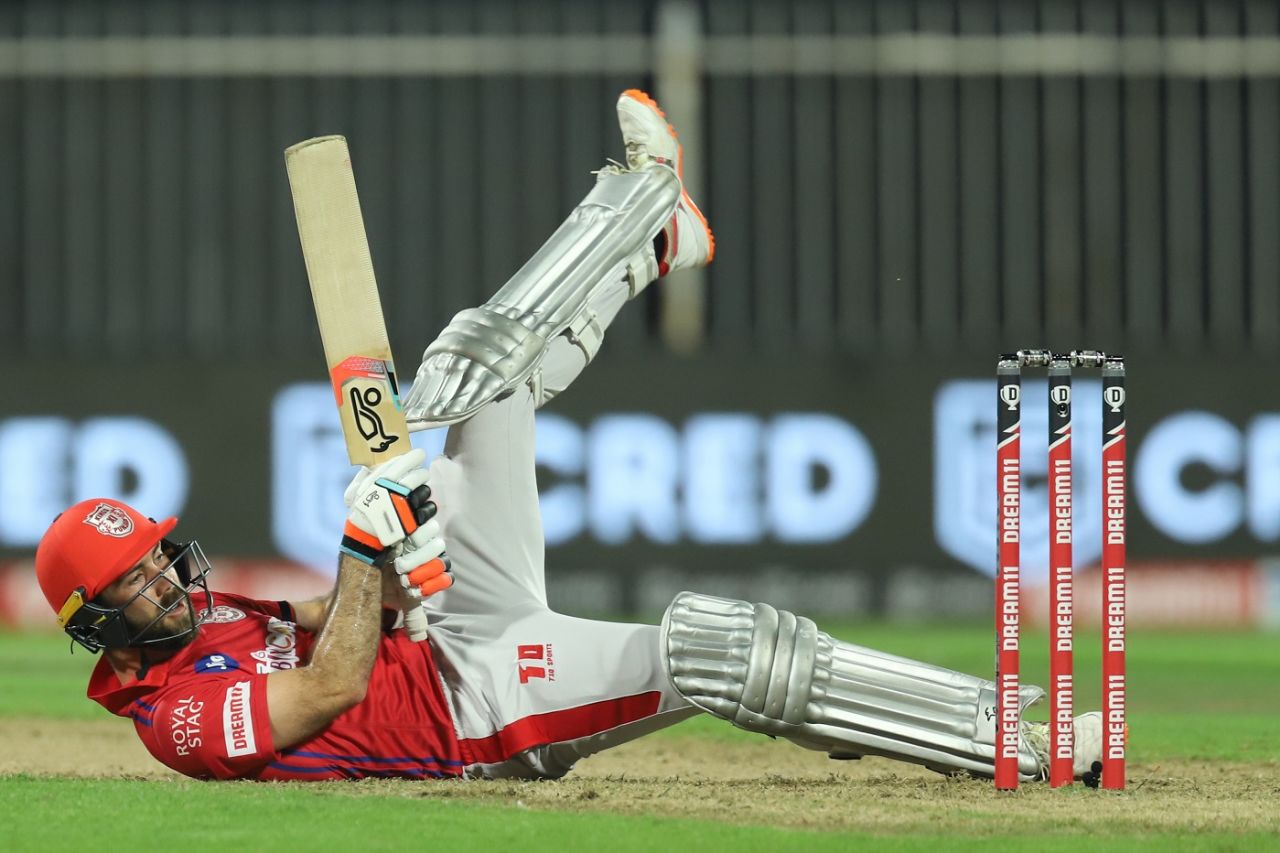 Glenn Maxwell falls on the floor after attempting an unorthodox shot, Kings XI Punjab v Rajasthan Royals, IPL 2020, Sharjah, September 27, 2020