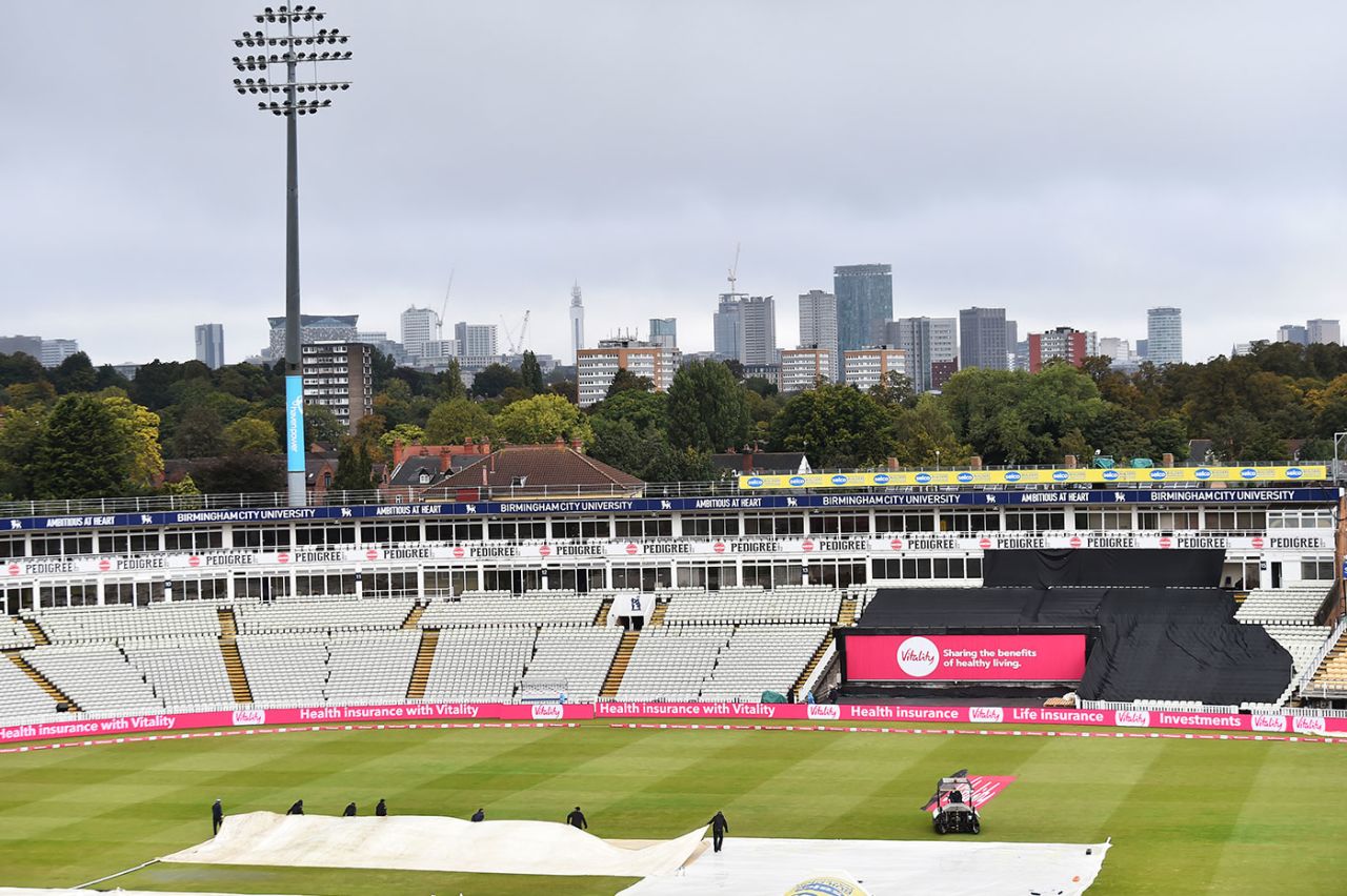 The groundstaff resume their battle with the elements on the reserve day of Finals Day, Surrey vs Gloucestershire, Vitality Blast semi-final, Edgbaston, October 4, 2020