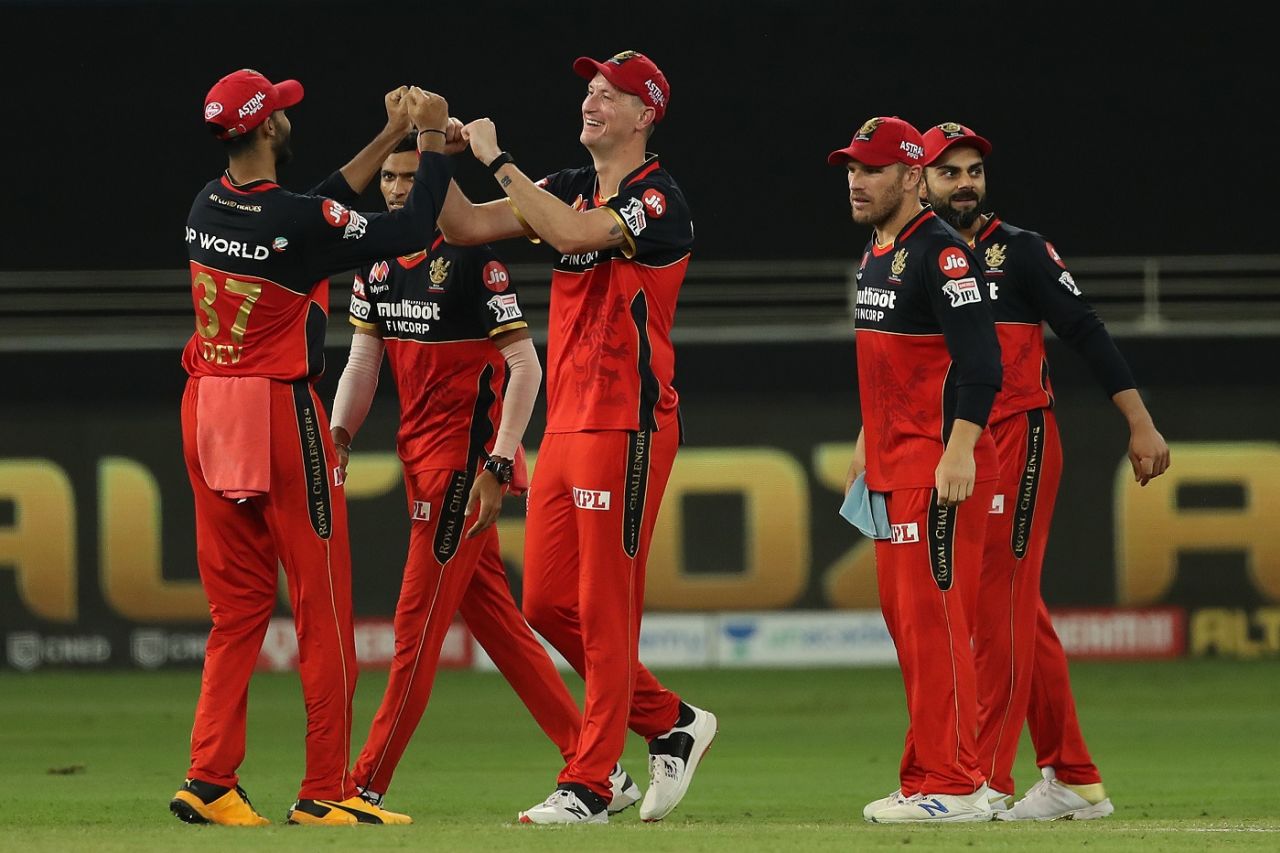 The Royal Challengers players celebrate a wicket, Royal Challengers Bangalore vs Chennai Super Kings, IPL 2020, Dubai, October 10, 2020