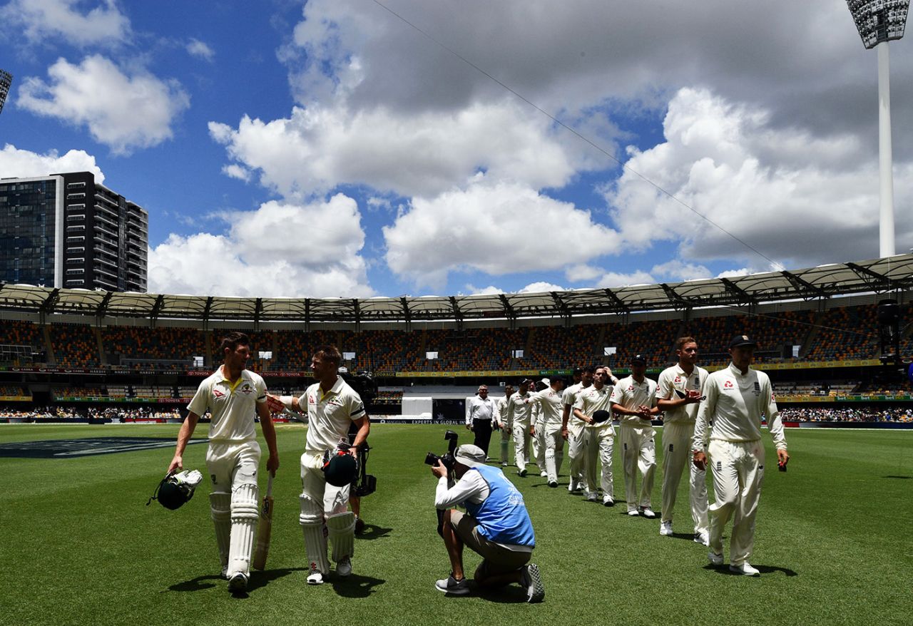 Cameron Bancroft and David Warner walk back along with the England players after Australia's victory in the first Test, Australia v England, The Ashes 2017-18, 1st Test, 5th day, Brisbane, November 27, 2017