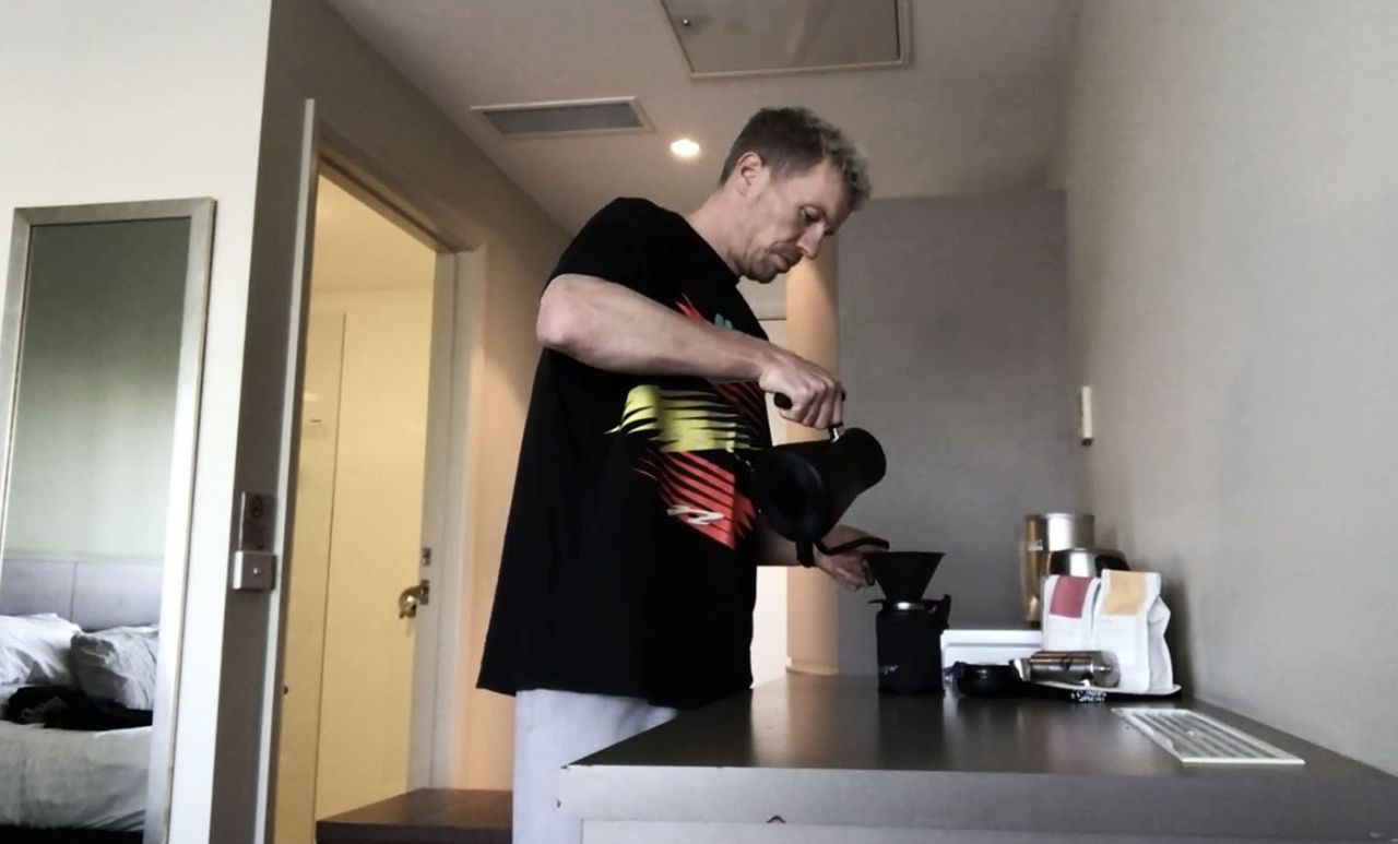 Peter Siddle makes coffee while he quarantines in his hotel room after travelling from Melbourne ahead of joining the Tasmania state squad, Hobart, July 29, 2020
