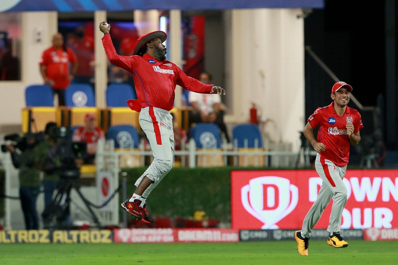 Chris Gayle leaps in excitement after taking a catch, Kolkata Knight Riders vs Kings XI Punjab, Sharjah, IPL 2020, October 26, 2020