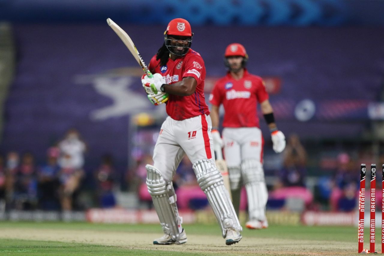 A rare sight - Chris Gayle loses his cool and is about to fling his bat after getting out on 99, Kings XI Punjab vs Rajasthan Royals, IPL 2020, Abu Dhabi, October 30, 2020