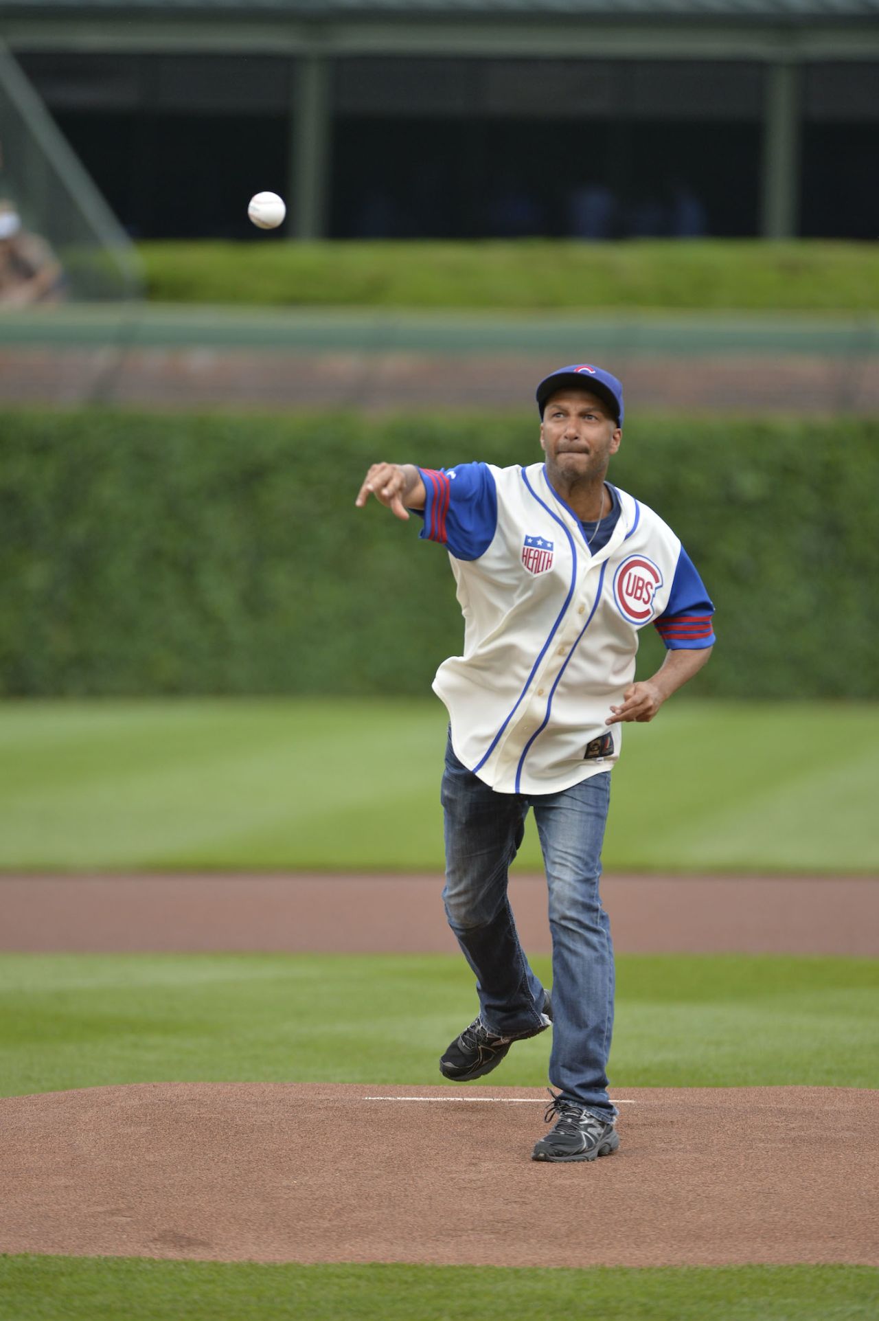 Guitarist Tom Morello throws out a ceremonial first pitch before the game between the Chicago Cubs and the Pittsburgh Pirates, Chigaco, June 20, 2014