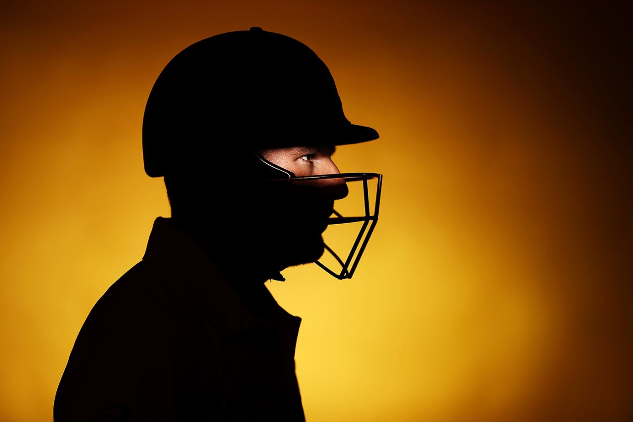 A profile shot of Aaron Finch