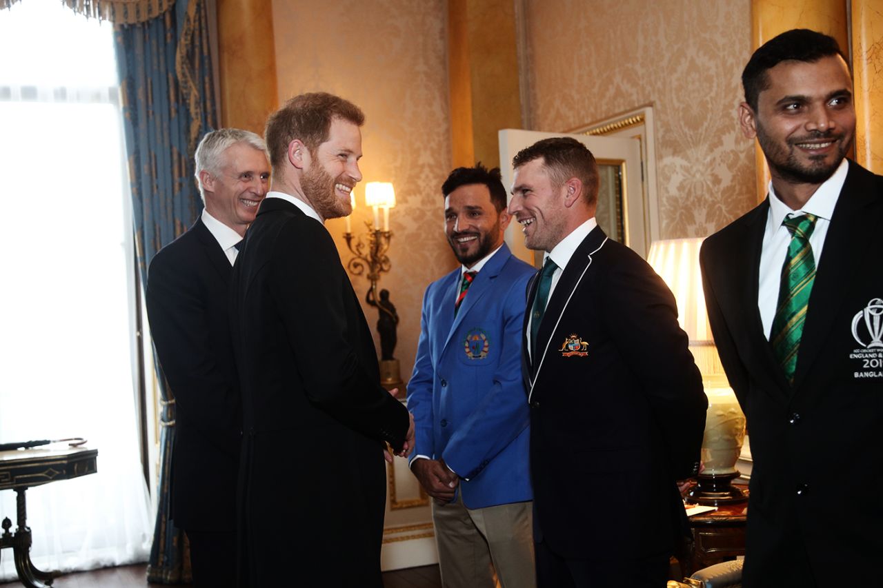 Prince Harry shares a laugh with Afghanistan captain Gulbadin Naib and Australia captain Aaron Finch, World Cup 2019, London, May 29, 2019