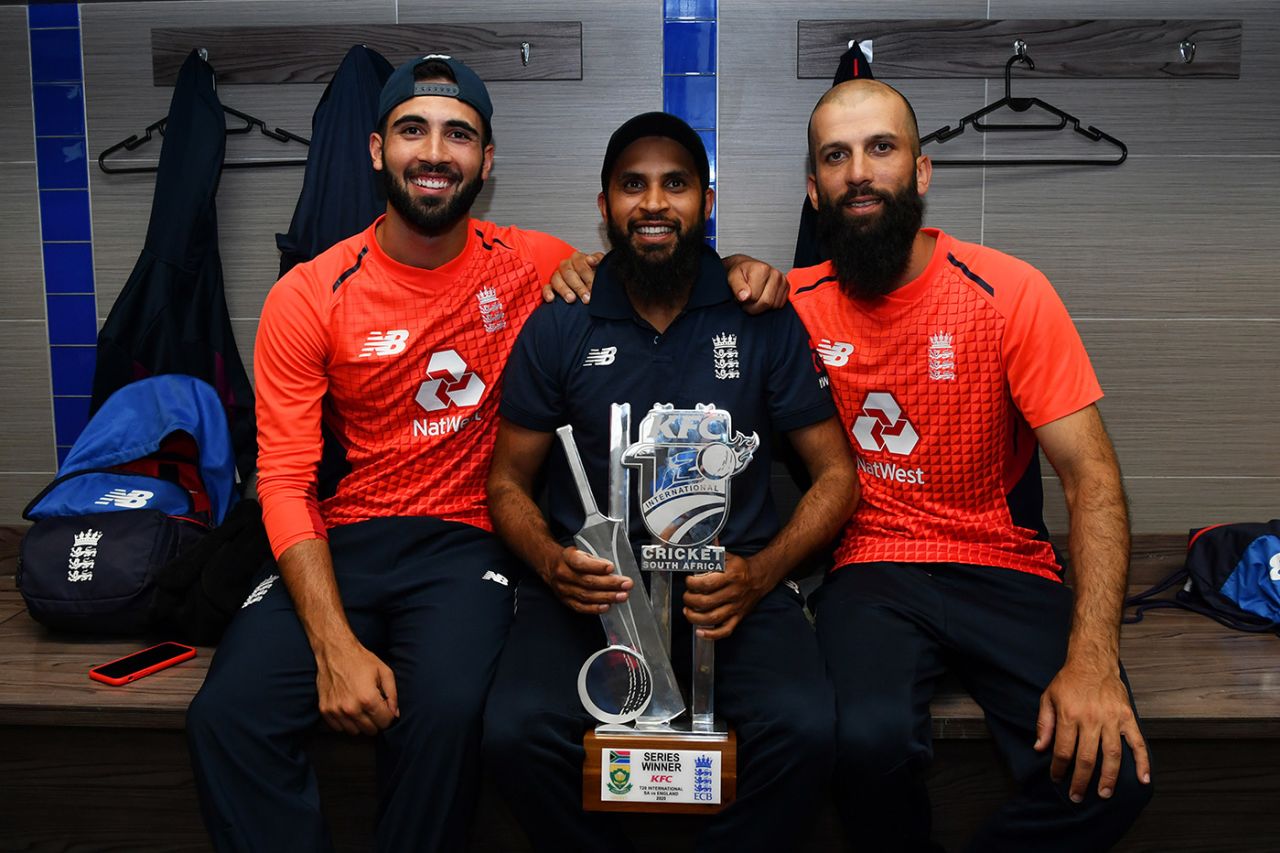 Saqib Mahmood, Adil Rashid and Moeen Ali pose with the silverware after their 2-1 series victory, South Africa v England, 3rd T20I, Centurion, February 16, 2020