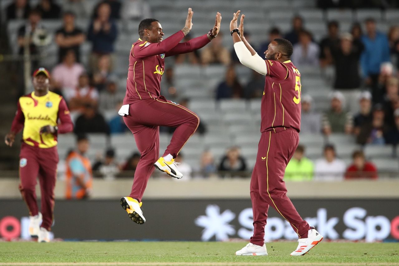 Fabian Allen and Kieron Pollard celebrate after Ross Taylor was run out, New Zealand vs West Indies, 1st T20I, Auckland, November 27, 2020