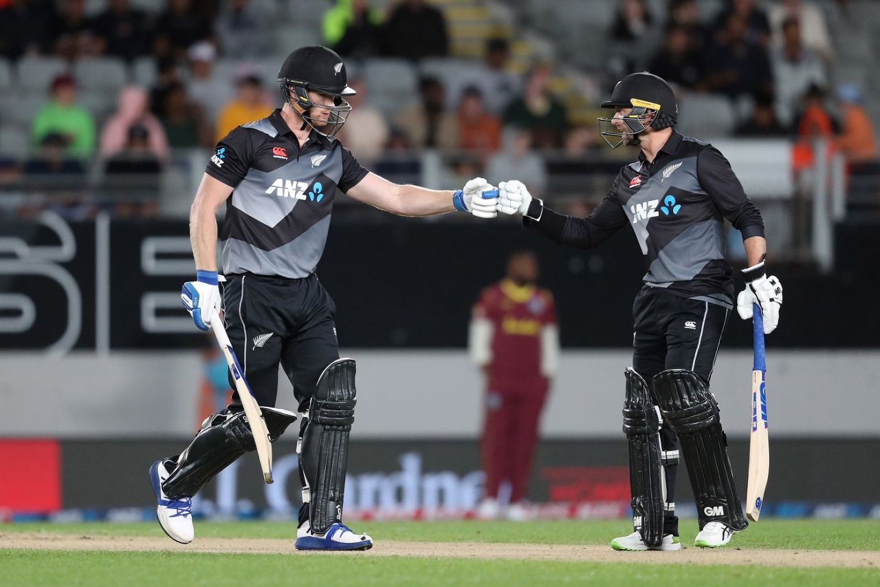 Jimmy Neesham and Devon Conway tap gloves during their partnership, 1st T20I, Auckland, November 27, 2020
