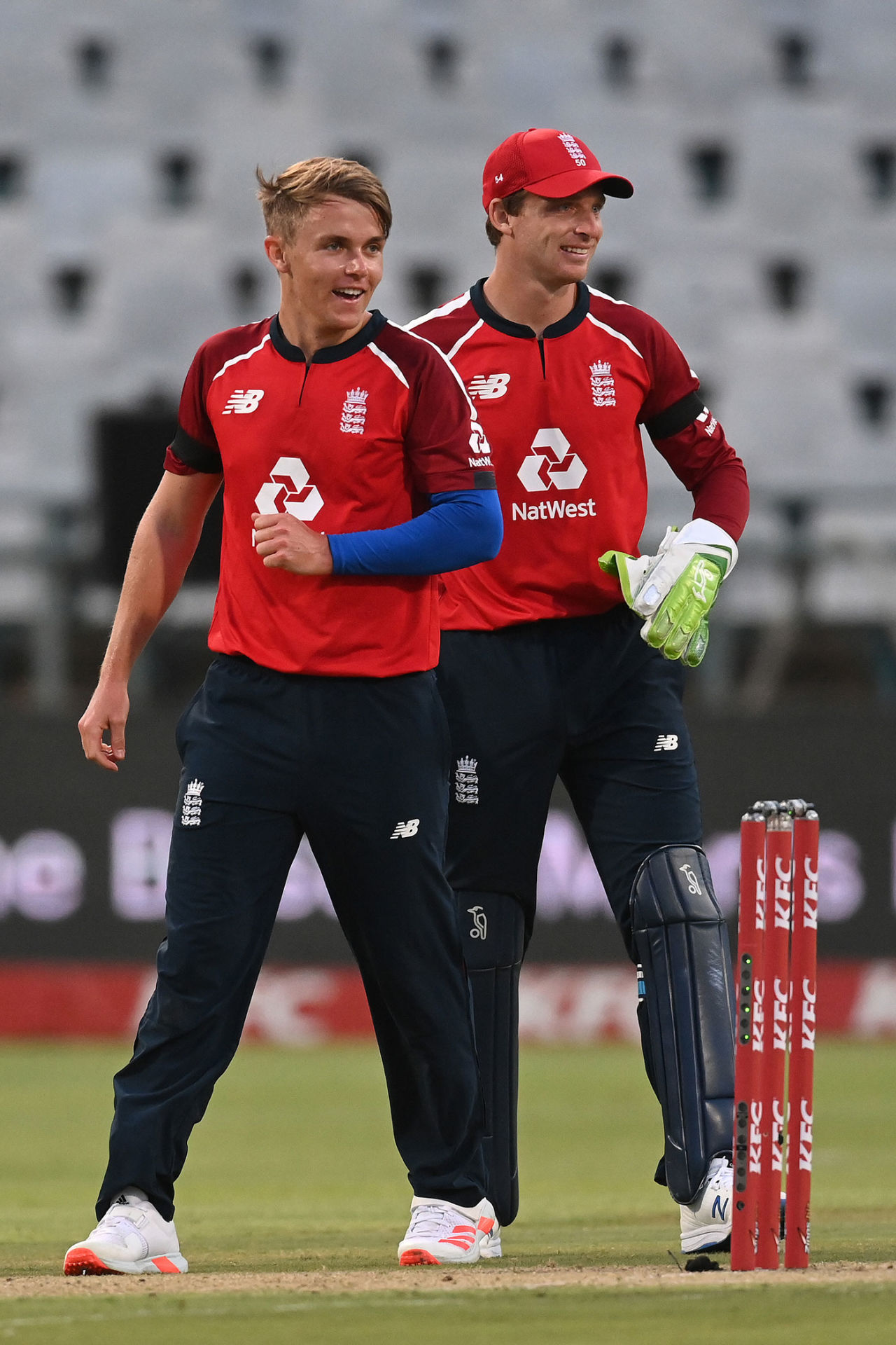 Sam Curran and Jos Buttler celebrate another England breakthrough, South Africa v England, 1st T20I, Cape Town, November 27, 2020