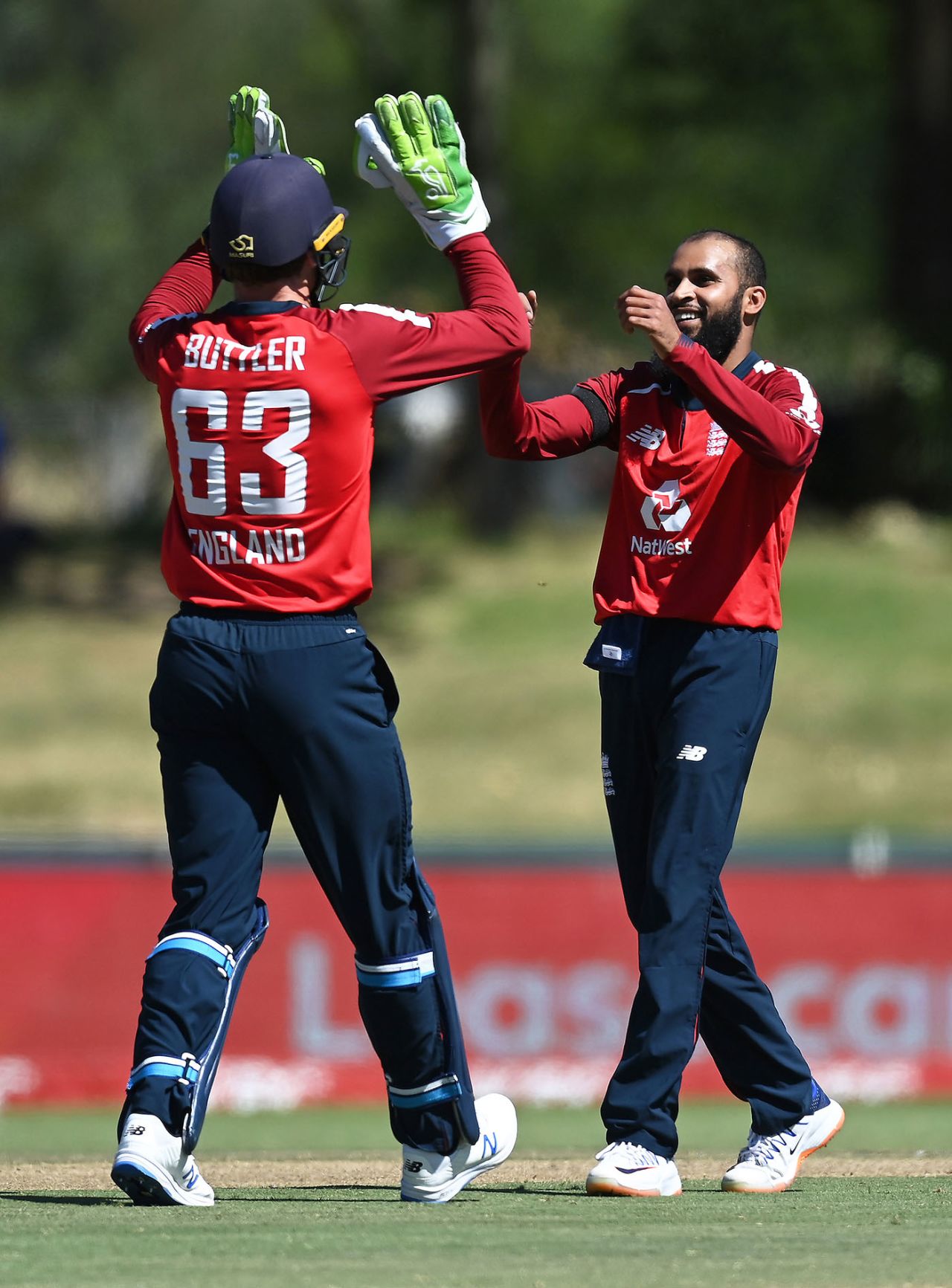 Adil Rashid celebrates with Jos Buttler, South Africa vs England, 2nd T20I, Paarl, November 29, 2020