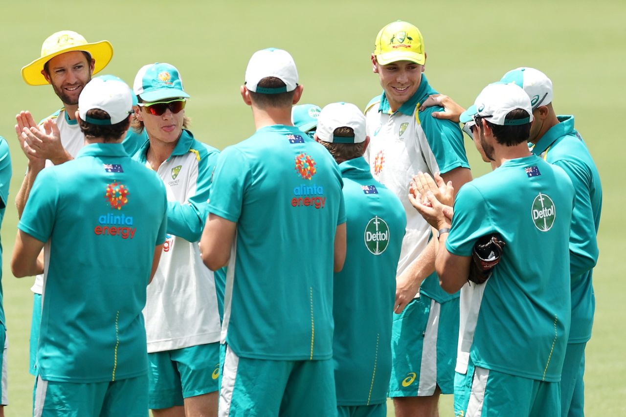 Cameron Green gets congratulated by the Australian squad after receiving his ODI cap for the first time, Australia vs India, 3rd ODI, Canberra, December 2, 2020