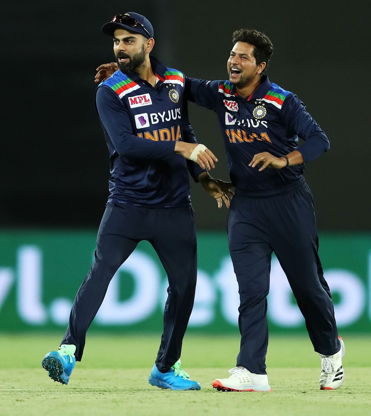 Virat Kohli and Kuldeep Yadav celebrate Cameron Green's wicket, Australia vs India, 3rd ODI, Canberra, December 2, 2020