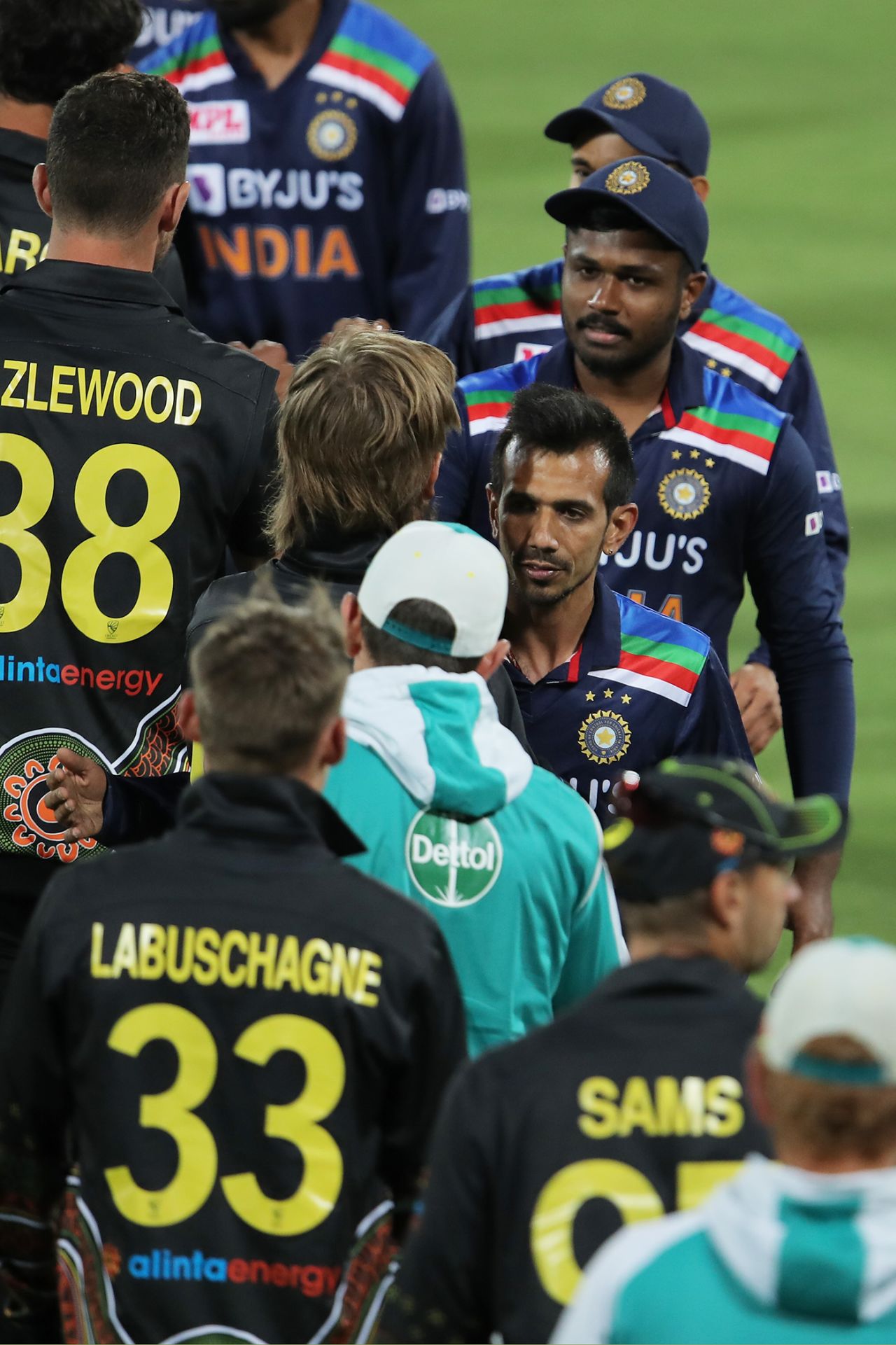 The teams greet each other after India clinched victory, Australia vs India, 1st T20I, Canberra, December 4, 2020