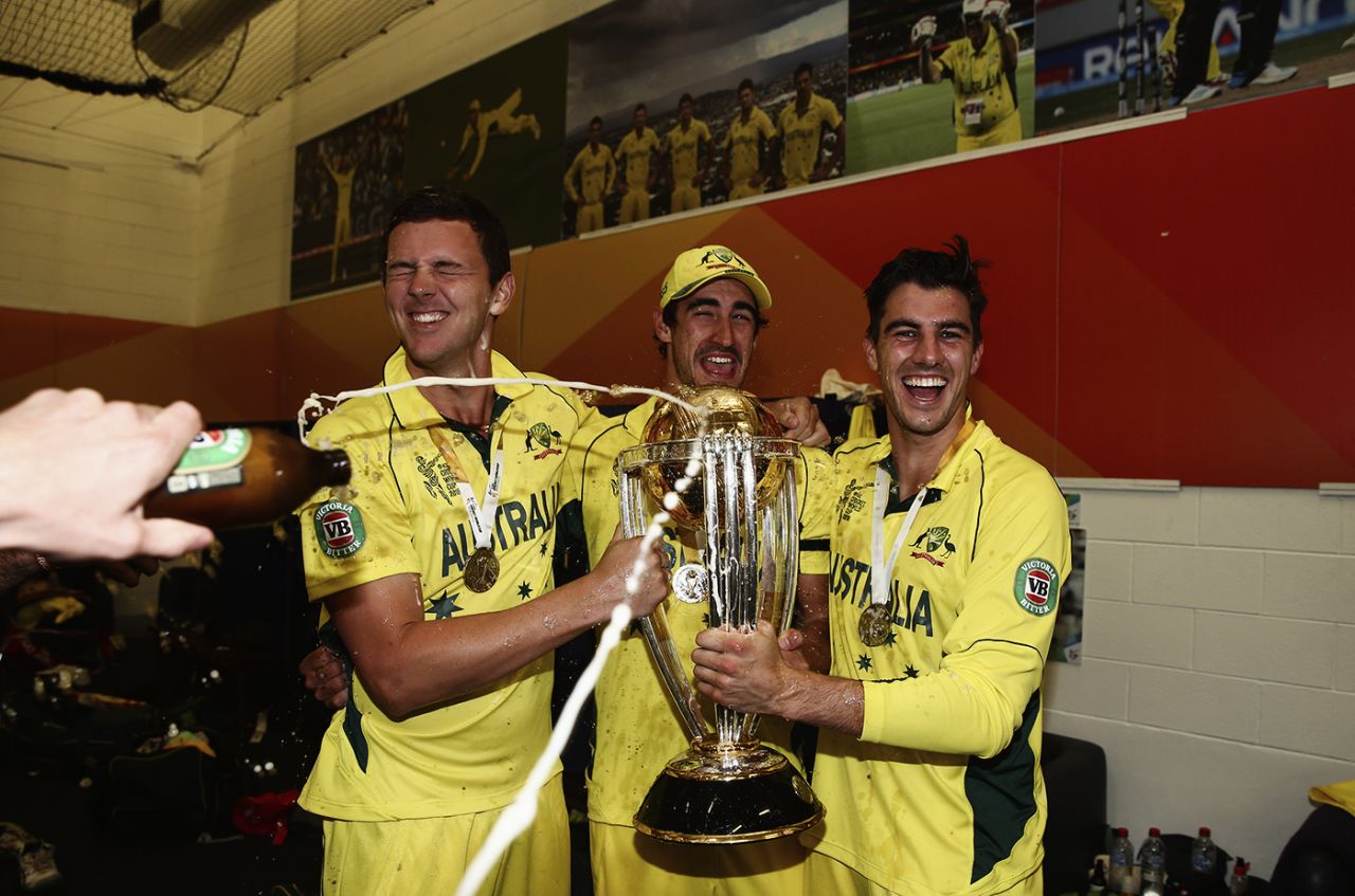 Josh Hazlewood, Mitchell Starc and Pat Cummins get sprayed with beer, Australia v New Zealand, World Cup 2015, final, Melbourne, March 29, 2015