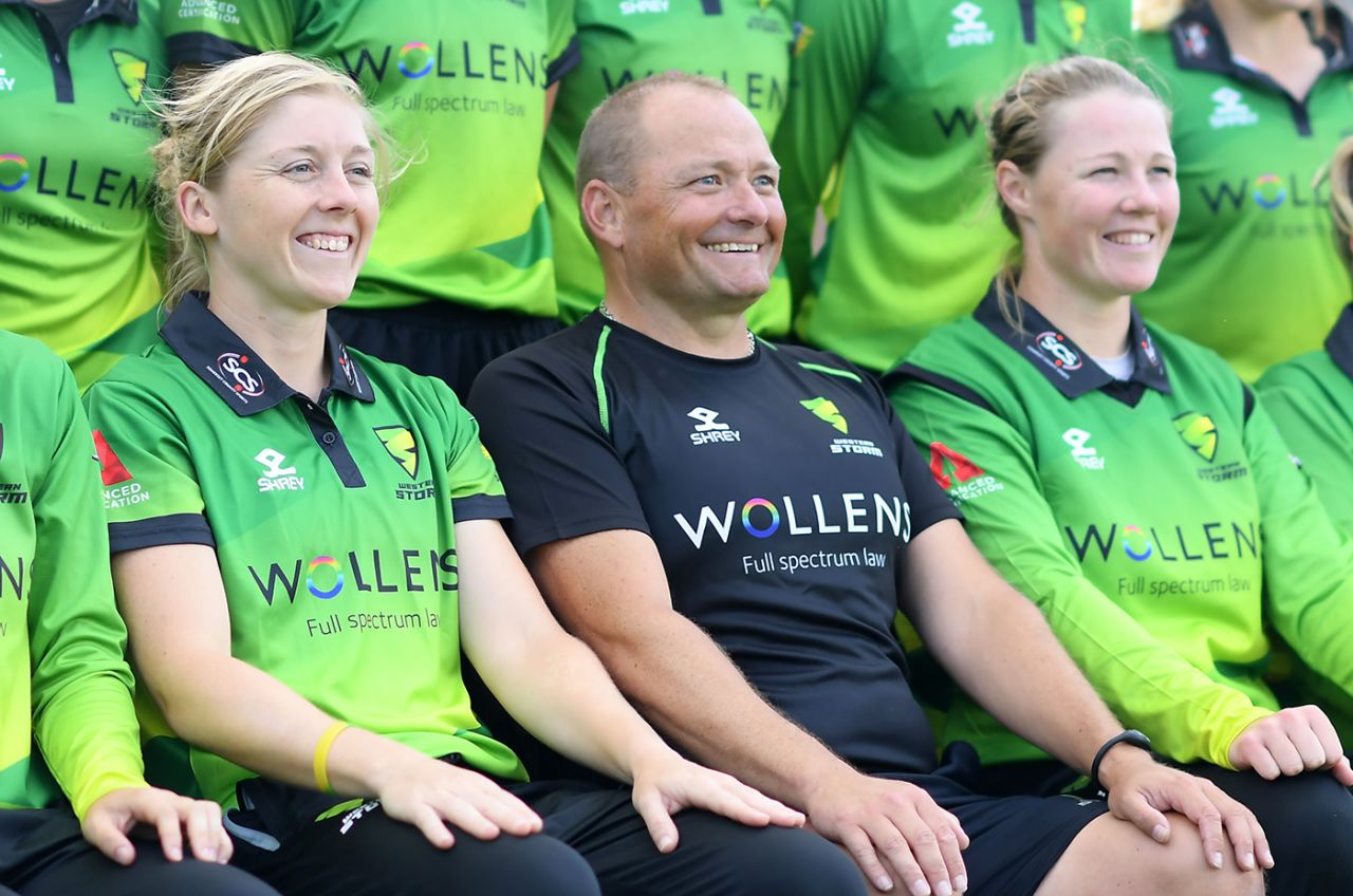 Trevor Griffin, Western Storm's head coach, sits between Heather Knight and Anya Shrubsole, August 3, 2019