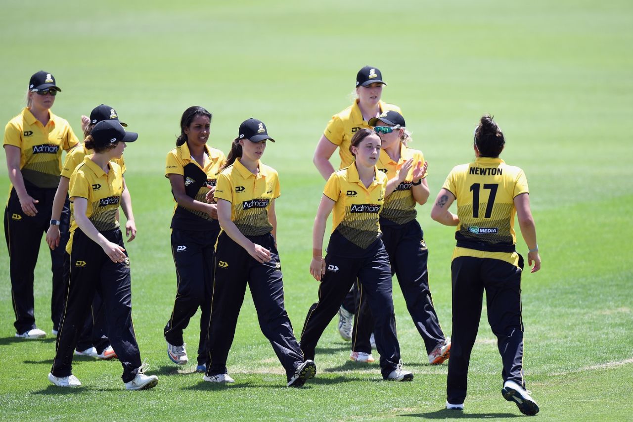 Kate Chandler is congratulated by her team-mates after completing her five-for, Canterbury women vs Wellington women, Hallyburton Johnstone Shield, Christchurch, December 19, 2020