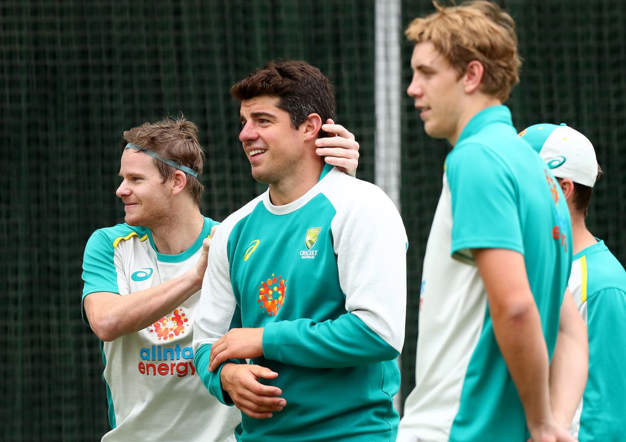Steven Smith shares a light moment in the nets with Moises Henriques, Melbourne, December 25, 2020