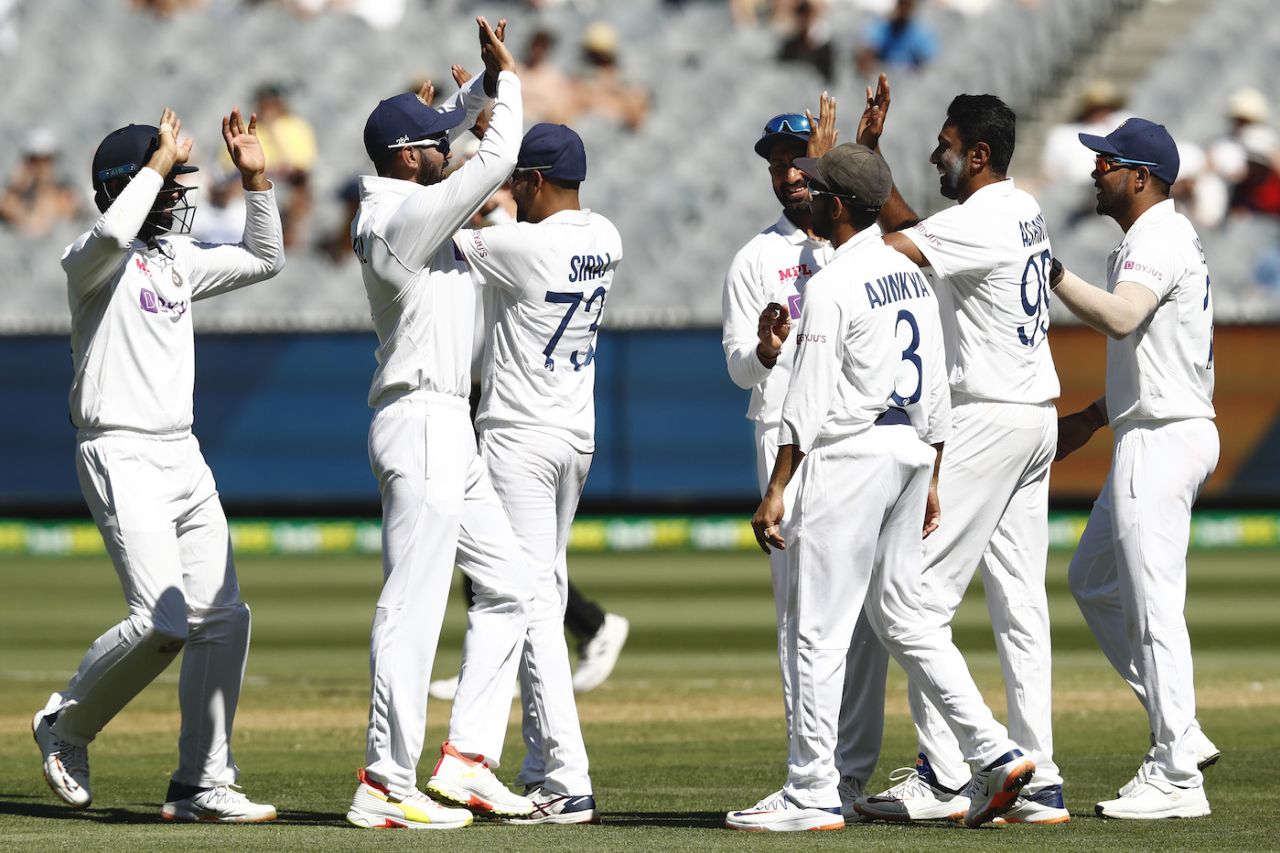 R Ashwin is congratulated after he dismissed Tim Paine, Australia v India, 2nd Test, Melbourne, December 26, 2020