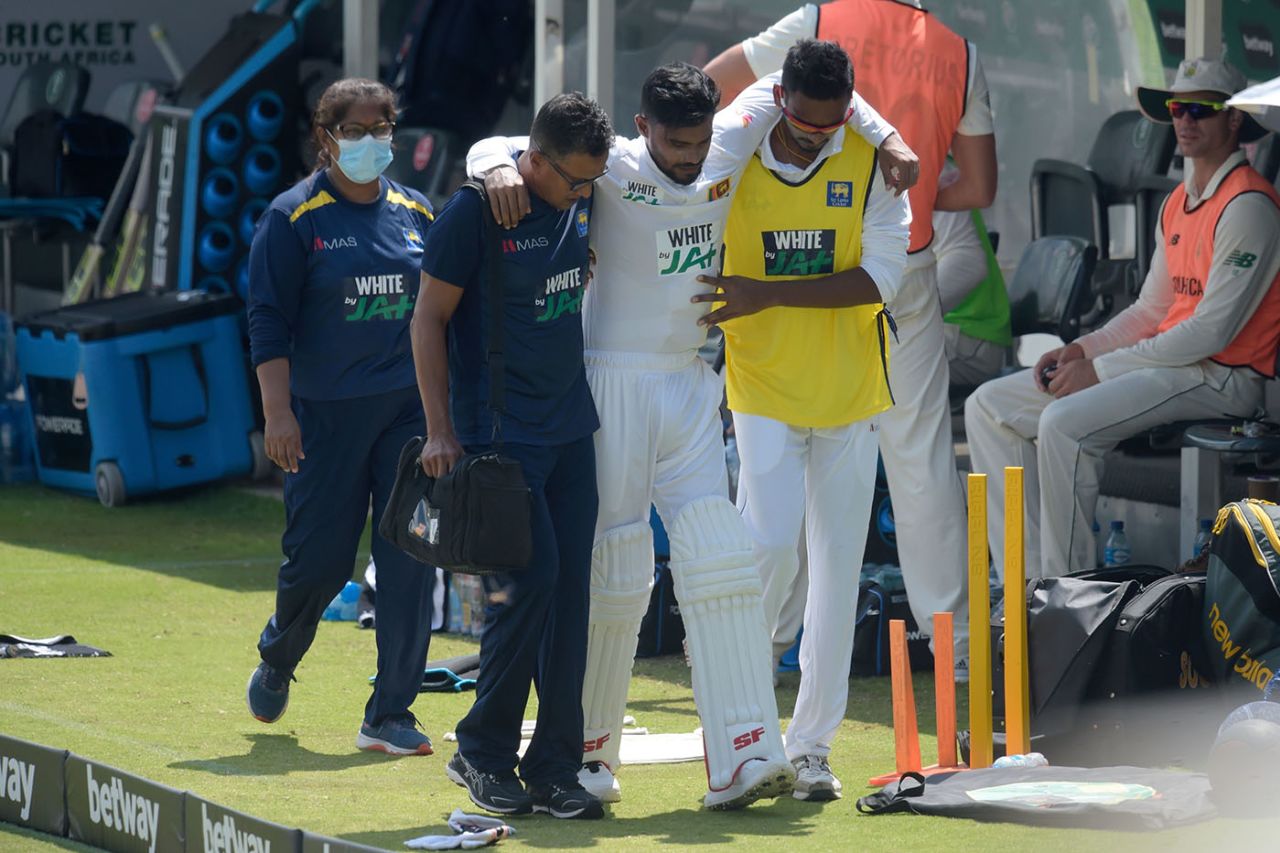 Dhananjaya de Silva is helped off after retiring hurt, South Africa v Sri Lanka, 1st Test, Centurion, December 26, 2020