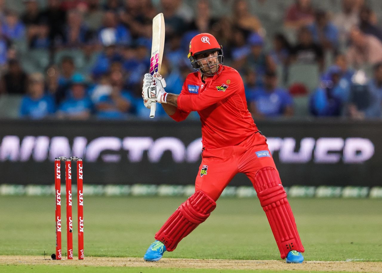 Mohammad Nabi shapes to dispatch the ball, Adelaide Strikers vs Melbourne Renegades, BBL 2020-21, Adelaide, January 8, 2021