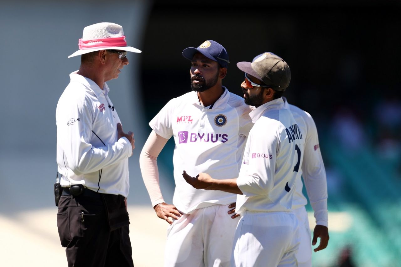 Mohammed Siraj and Ajinkya Rahane talk to umpire Paul Reiffel after spectators in the stands at SCG heckled Siraj, Australia vs India, 3rd Test, Sydney, 4th day, January 10, 2021