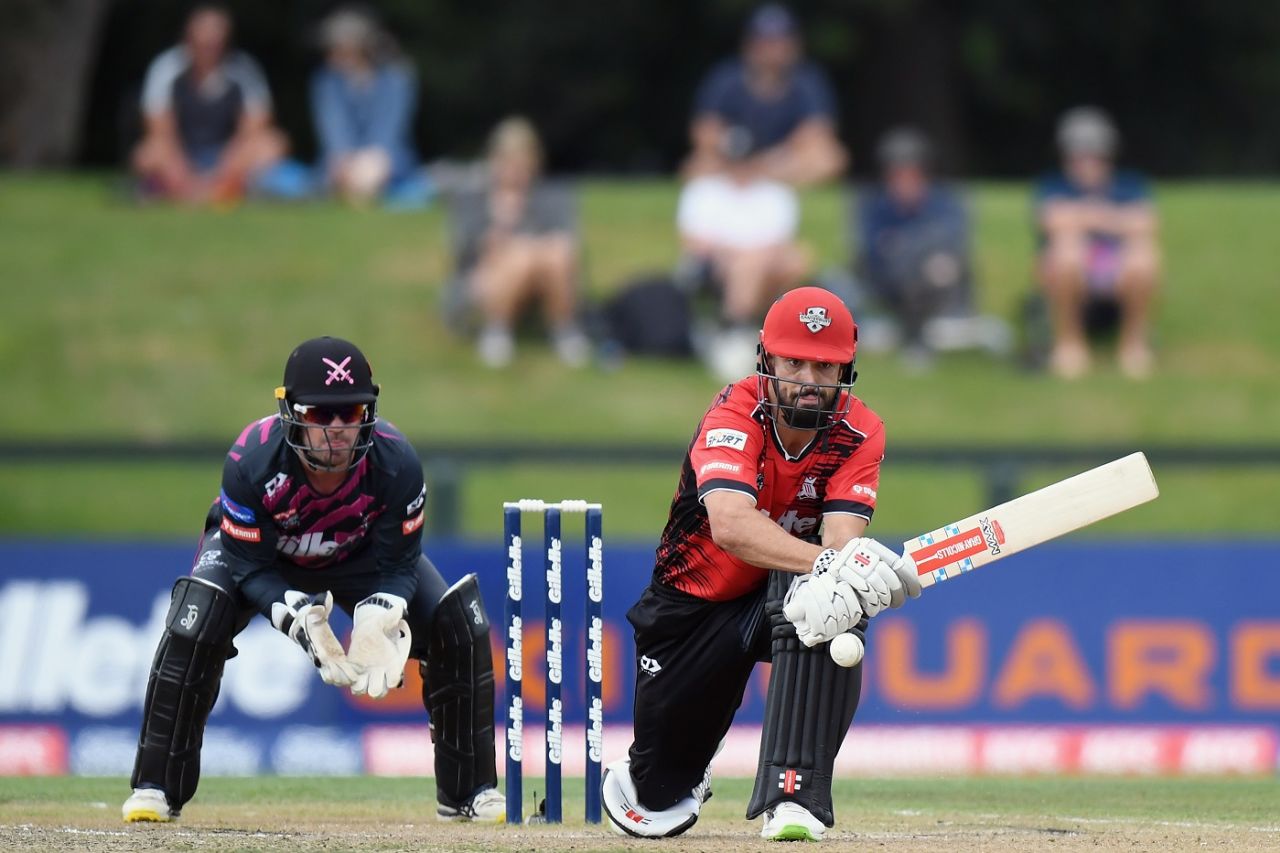 Daryl Mitchell lines up a reverse sweep during his 47-ball 69, Canterbury Kings vs Northern Knights, Super Smash 2020-21, Christchurch, January 15, 2021