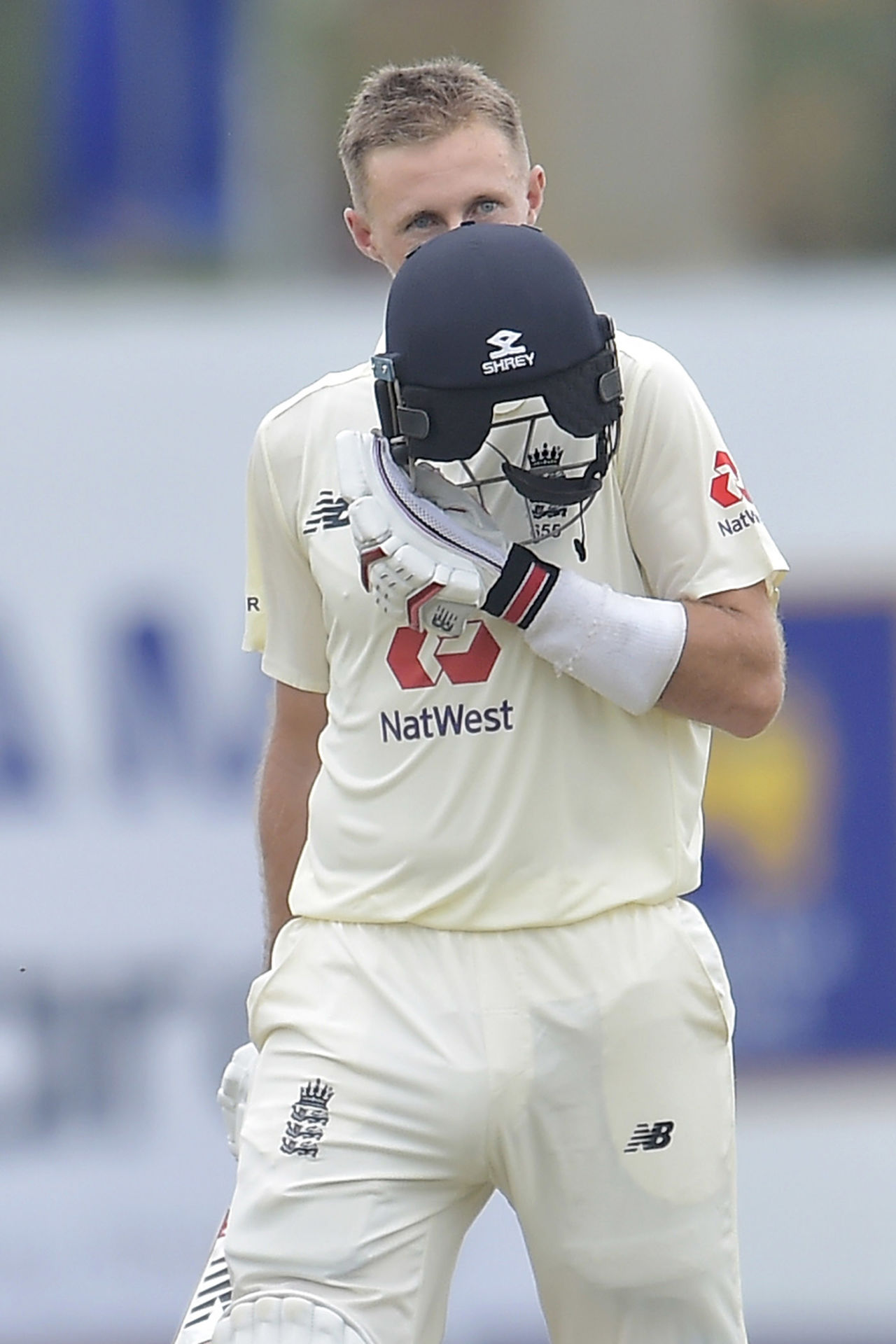 Joe Root kisses the badge after reaching 200, Sri Lanka v England, 1st Test, Galle, 3rd day, January 16, 2021