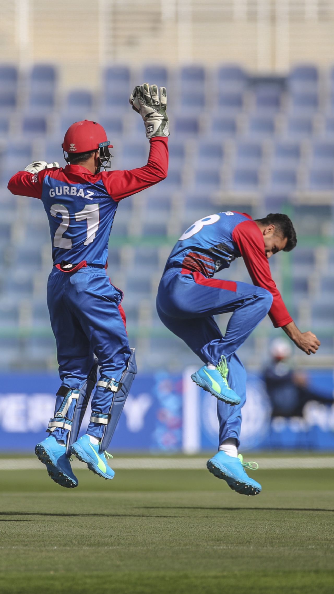 Mujeeb Ur Rahman and Rahmanullah Gurbaz celebrate a wicket, Afghanistan vs Ireland, 2nd ODI, Abu Dhabi, January 24, 2021