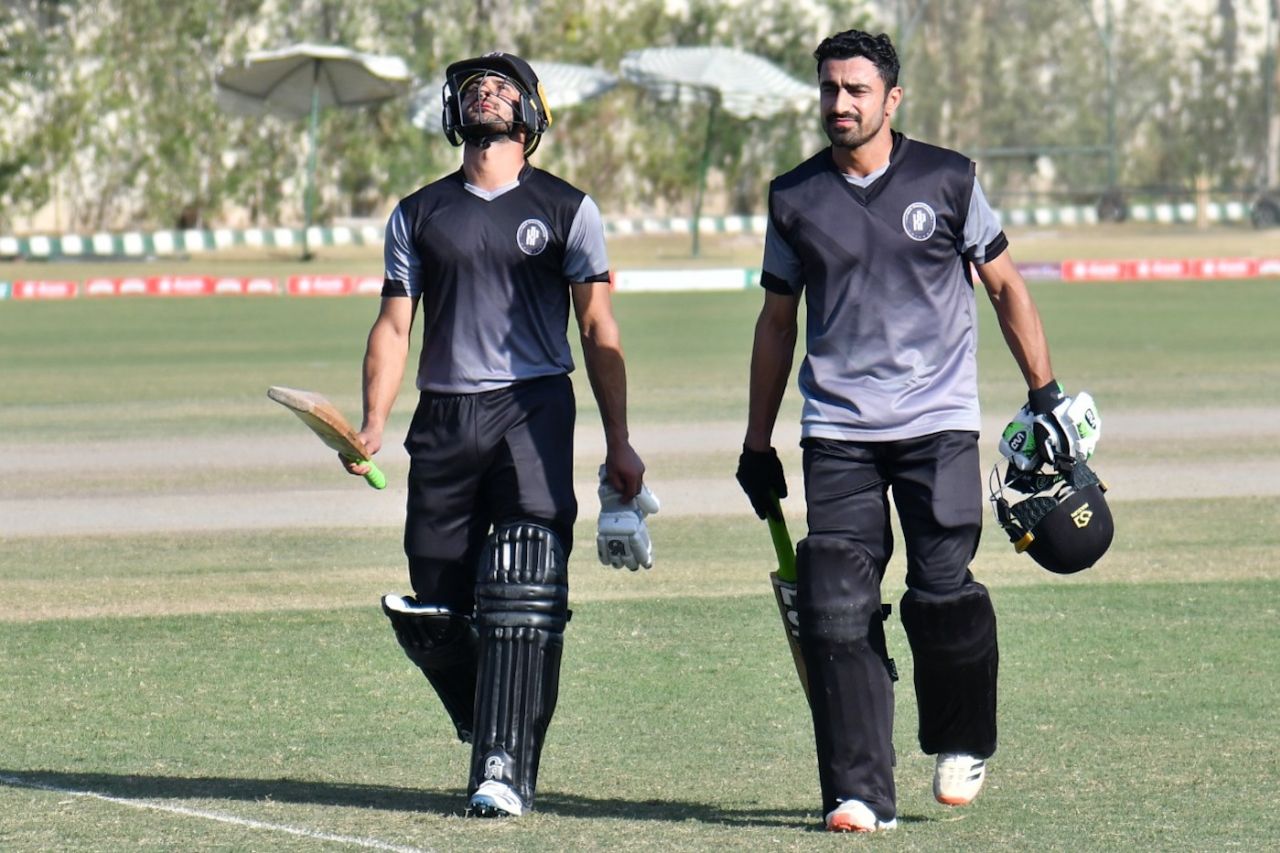 Sahibzada Farhan (left) and Adil Amin (right) walk back after Khyber Pakhtunkhwa's win, Central Punjab vs Khyber Pakhtunkhwa, Pakistan Cup, final, Karachi, January 31, 2021