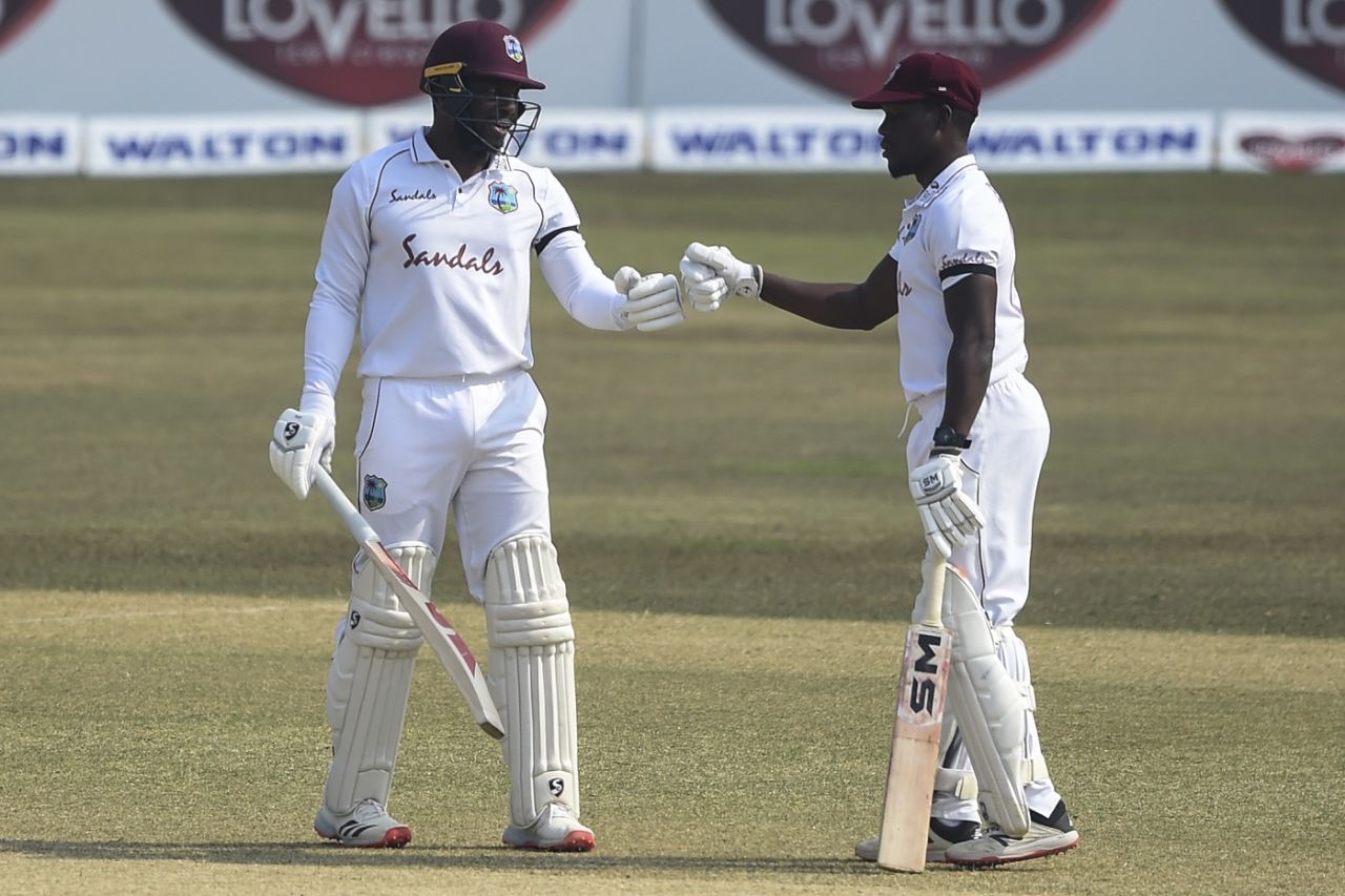 Kyle Mayers and Nkrumah Bonner punch gloves during their stand, Bangladesh vs West Indies, 1st Test, Chattogram, Day 5, February 7, 2021