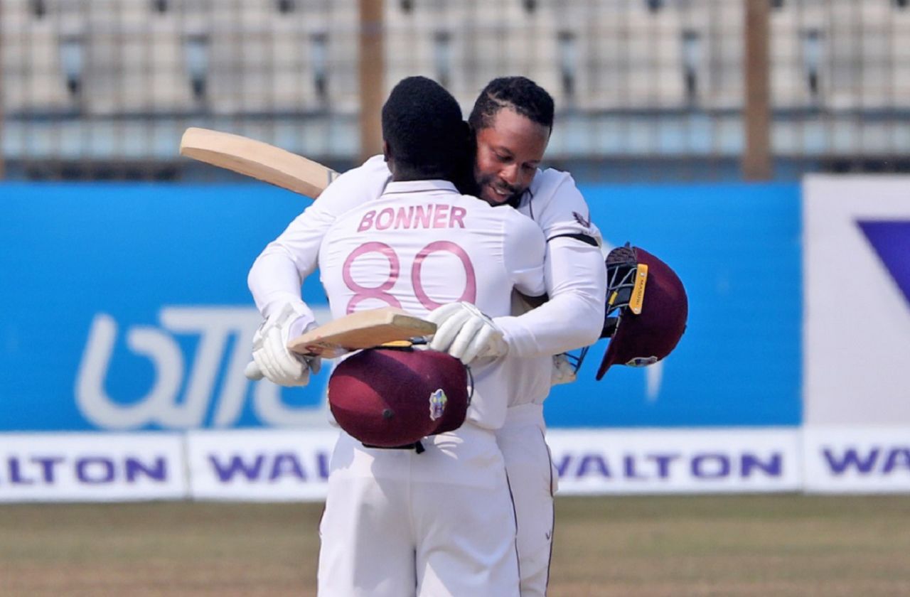 Centurion Kyle Mayers gets a hug from Nkrumah Bonner after reaching his maiden international ton, Bangladesh vs West Indies, 1st Test, Chattogram, Day 5, February 7, 2021