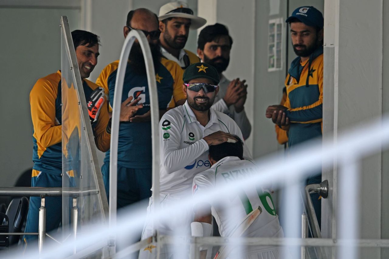 Mohammad Rizwan is congratulated by captain Babar Azam on reaching the dressing room, Pakistan vs South Africa, 2nd Test, Rawalpindi, 4th day, February 7, 2021