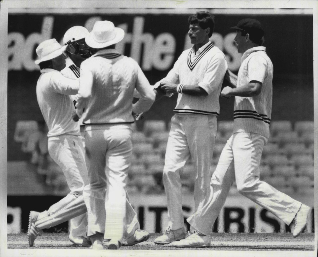 Team-mates mob Richard Hadlee after he took the wicket of opener Robbie Kerr, day two, second Test, Australia vs New Zealand, November 23, 1985