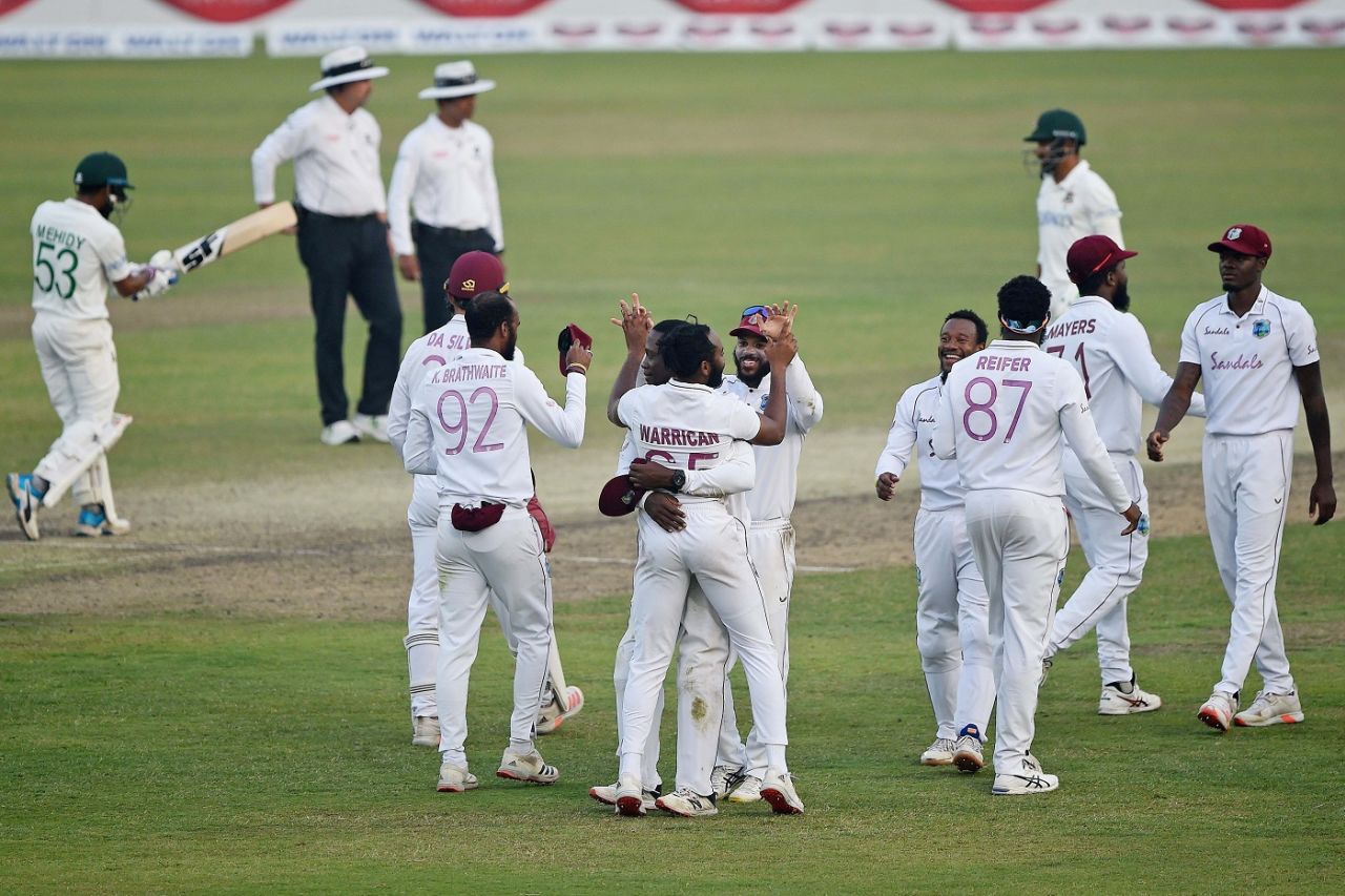 West Indies players gather around Jomel Warrican, who dismissed Mehidy Hasan Miraz to seal the visitors' series victory, Bangladesh vs West Indies, 2nd Test, Dhaka, 4th day, February 14, 2021