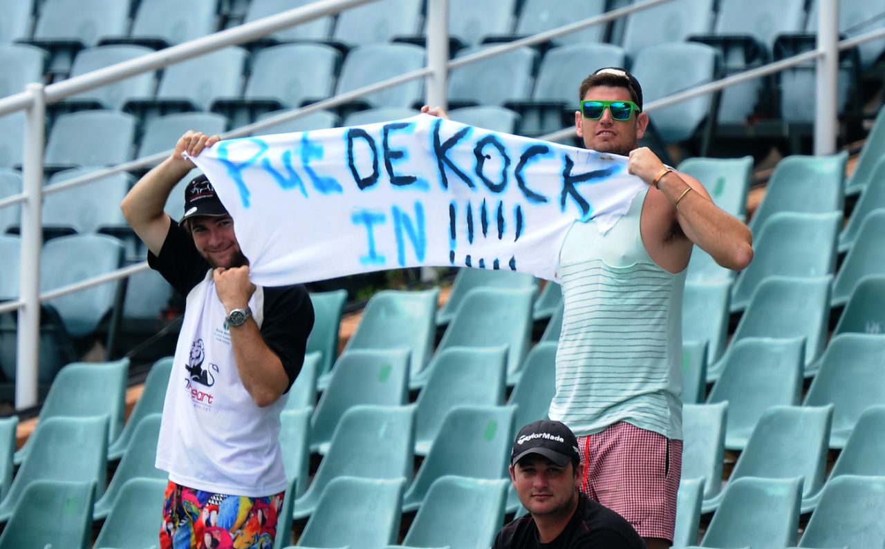South African cricket supporters hold up a banner in support of Quinton de Kock, third day, first test, South African vs India, the Wanderers Stadium, Johannesburg, December 20, 2013.