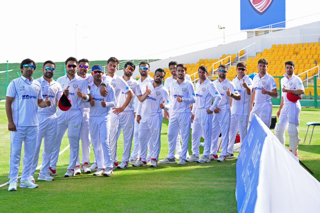 Asghar Afghan leads his Afghanistan squad out for the anthems, Afghanistan vs Zimbabwe, 1st Test, Abu Dhabi, 1st day, March 2, 2021