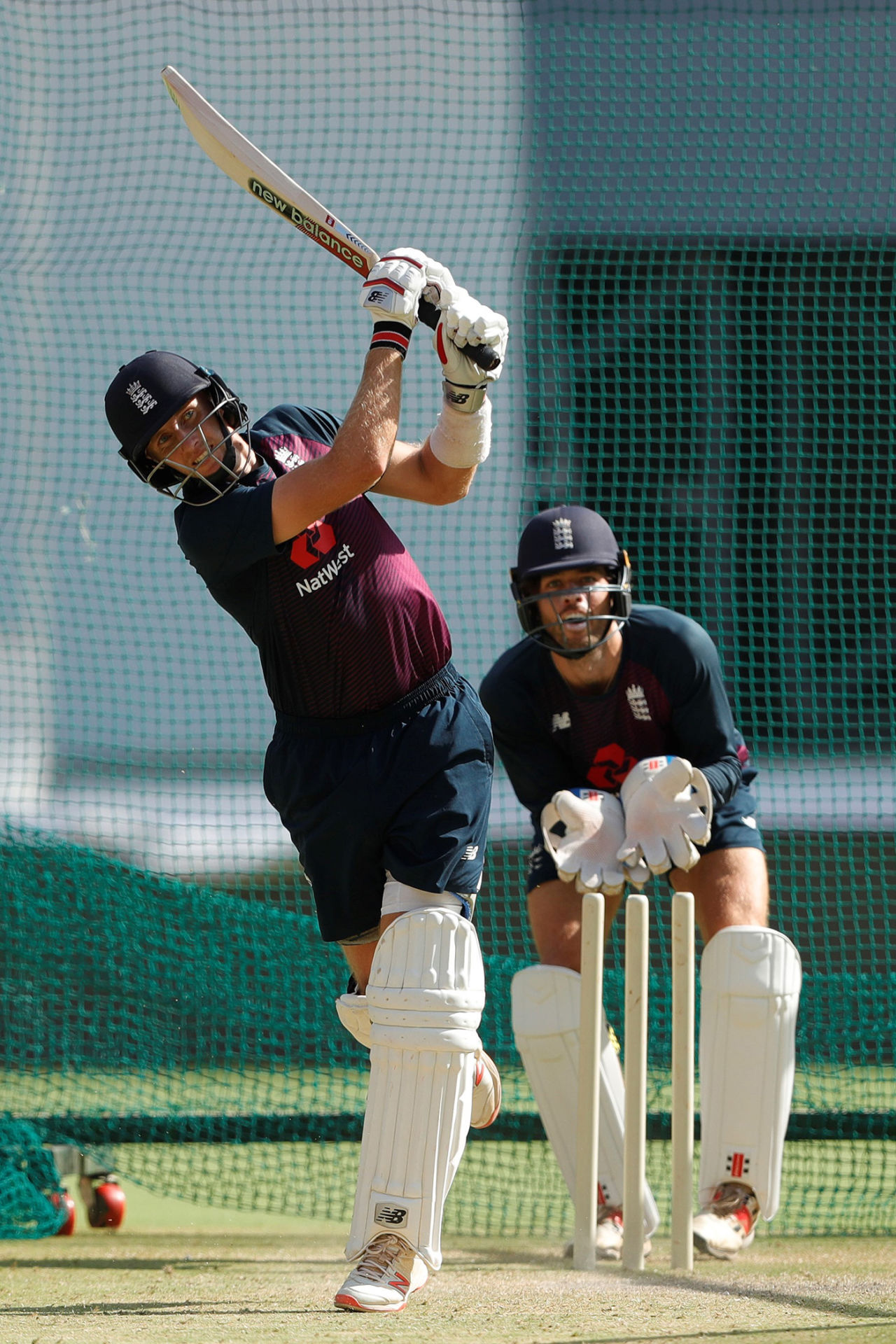 Joe Root hits out in the nets, watched by Ben Foakes, Ahmedabad, 2 March 2021