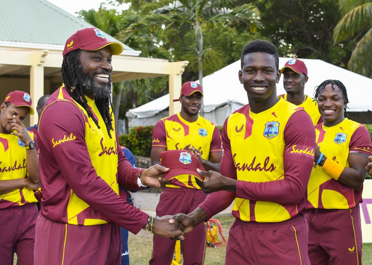 Debutant Kevin Sinclair receives his T20I cap from Chris Gayle, West Indies vs Sri Lanka, 1st T20I, Coolidge, March 3, 2021