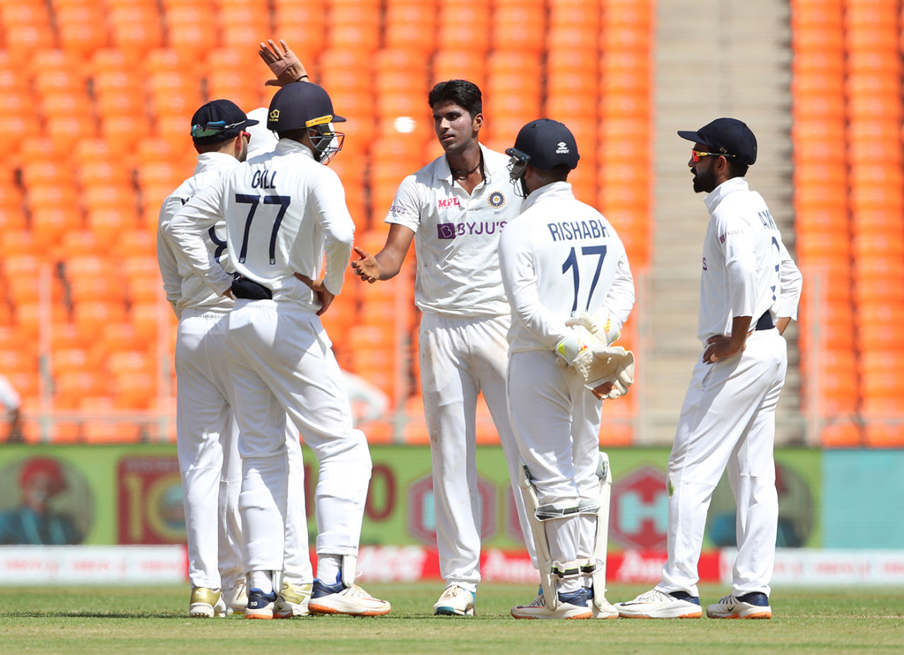 India's fielders congratulate Washington Sundar after he trapped Ben Stokes lbw, India vs England, 4th Test, Ahmedabad, 1st Day, March 4, 2021