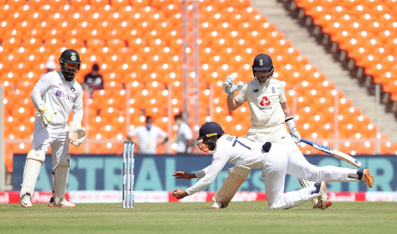 Shubman Gill fields the ball at silly point as Ollie Pope and Rishabh Pant watch, India vs England, 4th Test, Ahmedabad, 1st Day, March 4, 2021