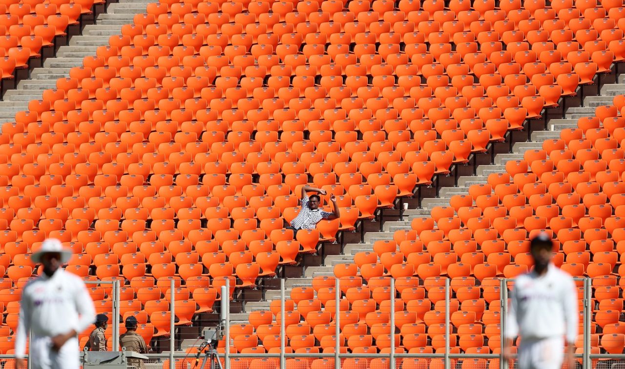 Social-distancing 101: A spectator at the Narendra Modi Stadium watches England bat on the opening day, India vs England, 4th Test, Ahmedabad, 1st Day, March 4, 2021