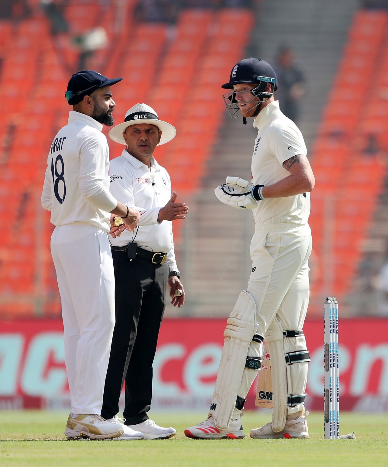 Virat Kohli and Ben Stokes exchange words during a staredown, while umpire Virender Sharma tries to keep the peace, India vs England, 4th Test, Ahmedabad, 1st Day, March 4, 2021