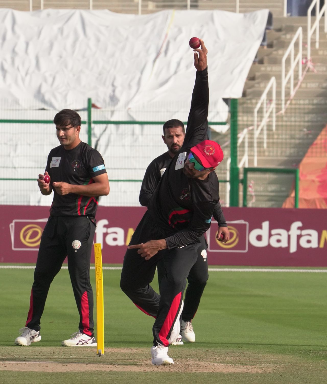 Rashid Khan has a bowl before the game, Afghanistan vs Zimbabwe, 2nd Test, Abu Dhabi, 1st day, March 10, 2021