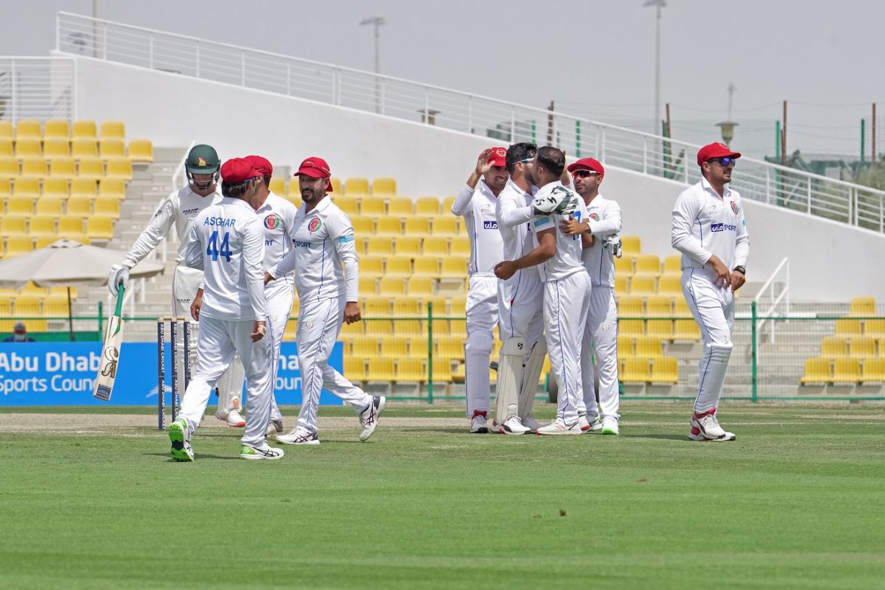 Sayed Shirzad celebrates a wicket with his team-mates, Afghanistan vs Zimbabwe, 2nd Test, Abu Dhabi, 3rd day, March 12, 2021