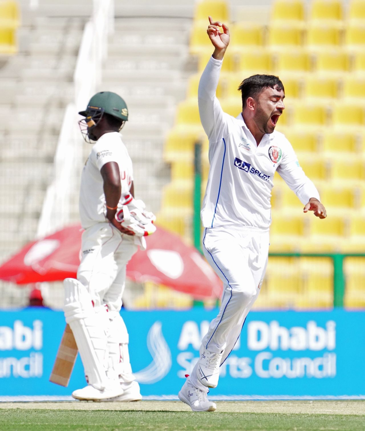 Rashid Khan is jubilant after picking up a wicket, Afghanistan vs Zimbabwe, 2nd Test, Abu Dhabi, 3rd day, March 12, 2021