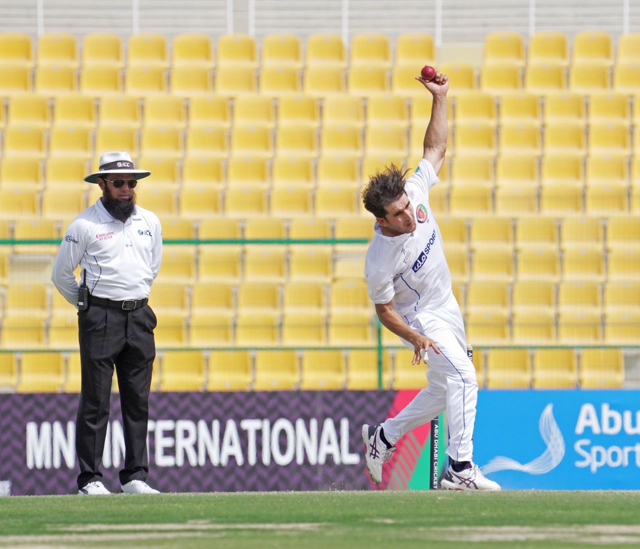 Amir Hamza bowls as umpire Aleem Dar looks on, Afghanistan vs Zimbabwe, 2nd Test, Abu Dhabi, 4th day, March 13, 2021